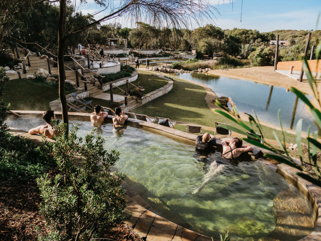 A group of bathing in hot pools on a day trip near melbourne